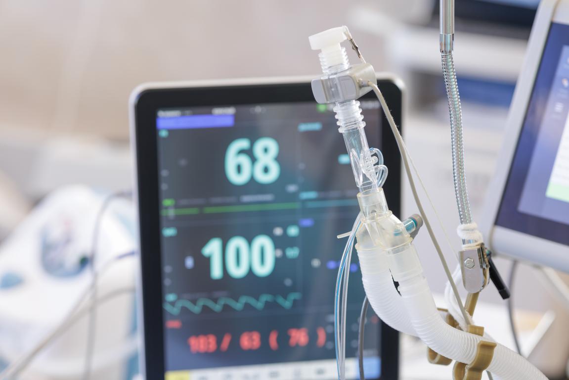 A close-up of a hospital monitor displaying critical patient vital signs and waveforms, similar to the data observed during ICD implantation or follow-up