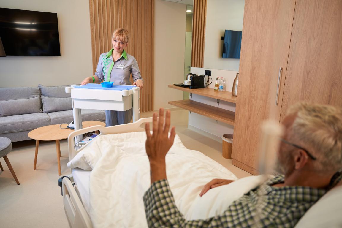  Hospital staff provide attentive care to a patient recovering in their room after ICD implantation.