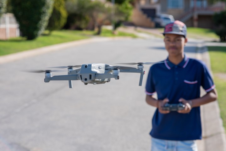 flying a drone low on a road