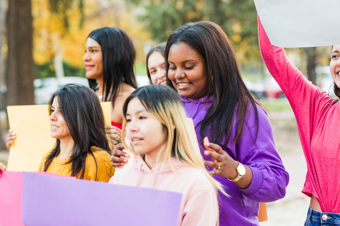 Diverse group of students taking part in a society or club event outdoors