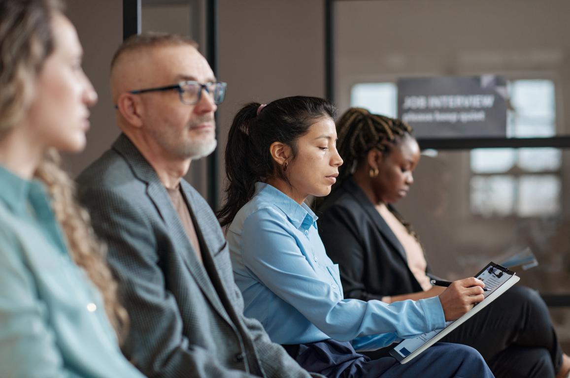 Job candidates waiting for their interview – exactly when a training ID card in your pocket can make all the difference.