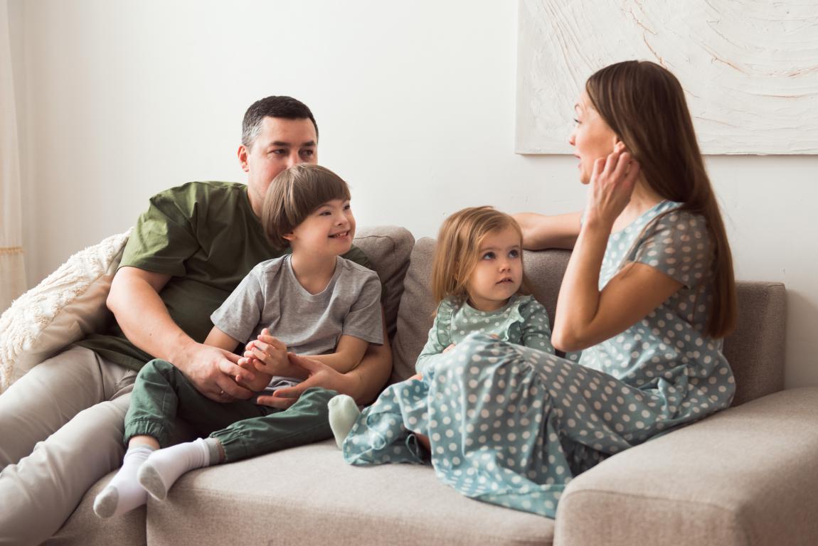 Mother talking to child about important health details.