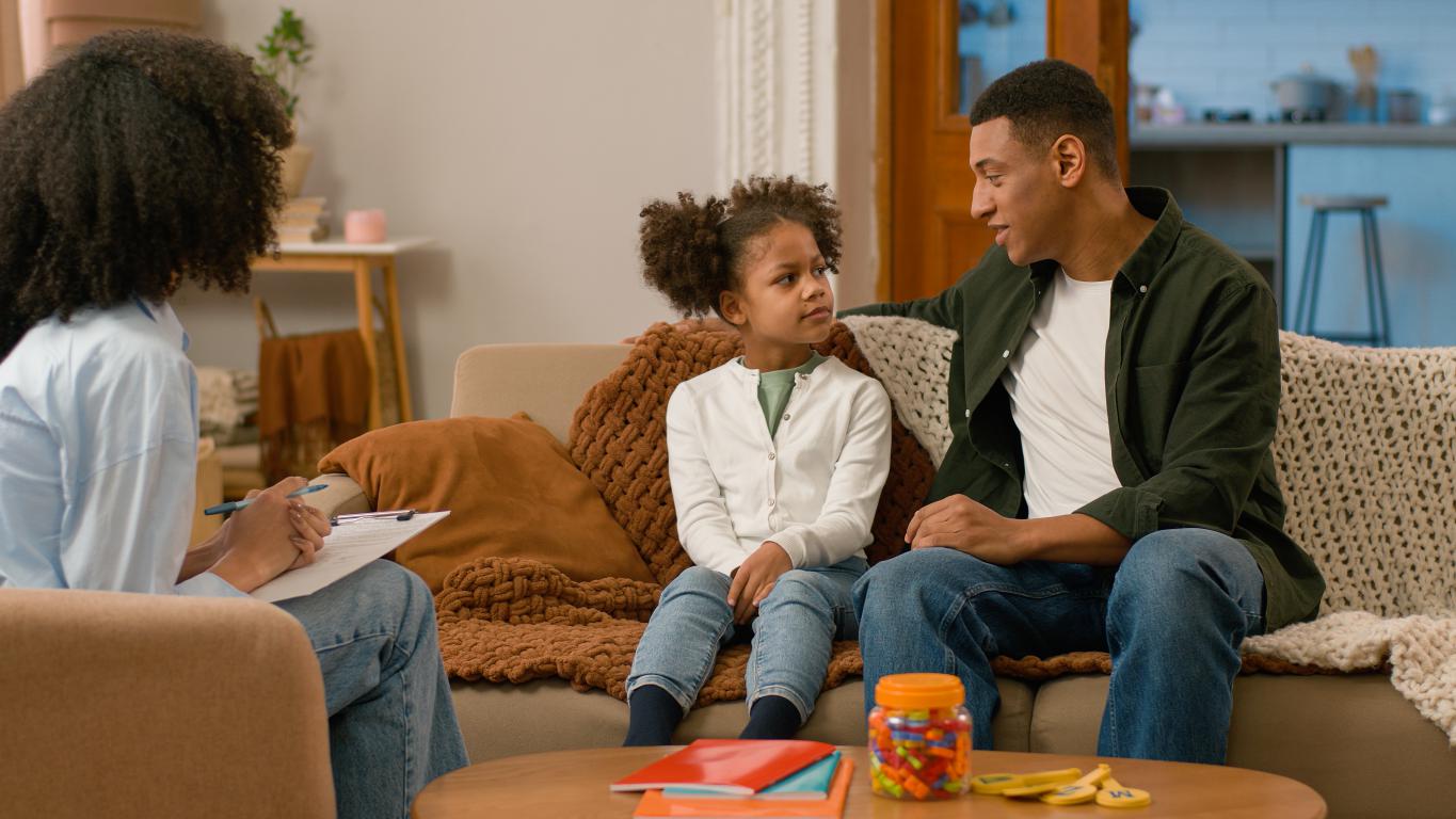 Supportive talk about medical card with young child.